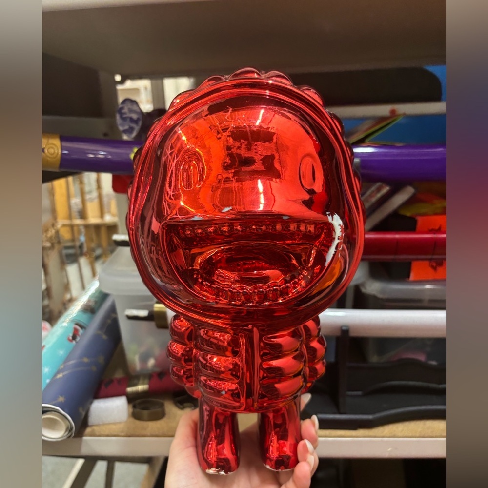 Limited edition Moncler Genius Monster Statue in a red chrome finish